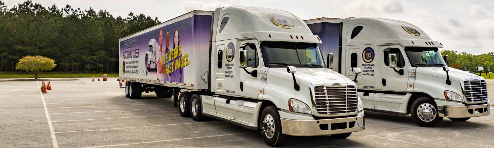 A photograph of the FDTC commercial driver training trucks.